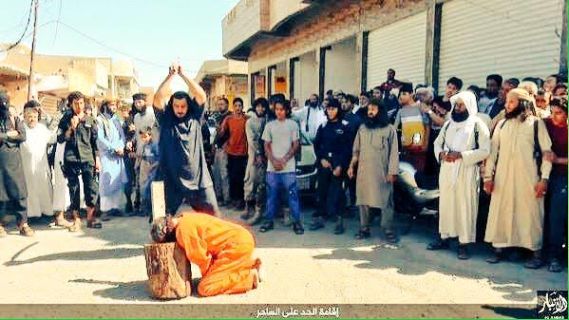 İŞİD mahnıya qulaq asan uşağın başını kəsdi