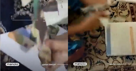 İranda şagirdlər respublika liderlərinin şəkillərini dərsliklərdən qoparıb atırlar – VİDEO